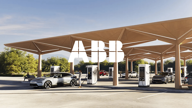 ABB EV-Charging station with modern cars under a canopy, highlighting eMobility and the future of mobility.