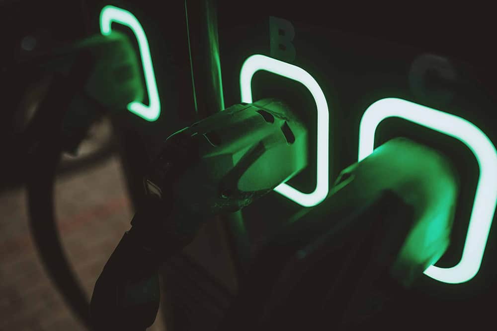 EV-Charging station glowing in the dark, representing the future of mobility through eMobility innovation.