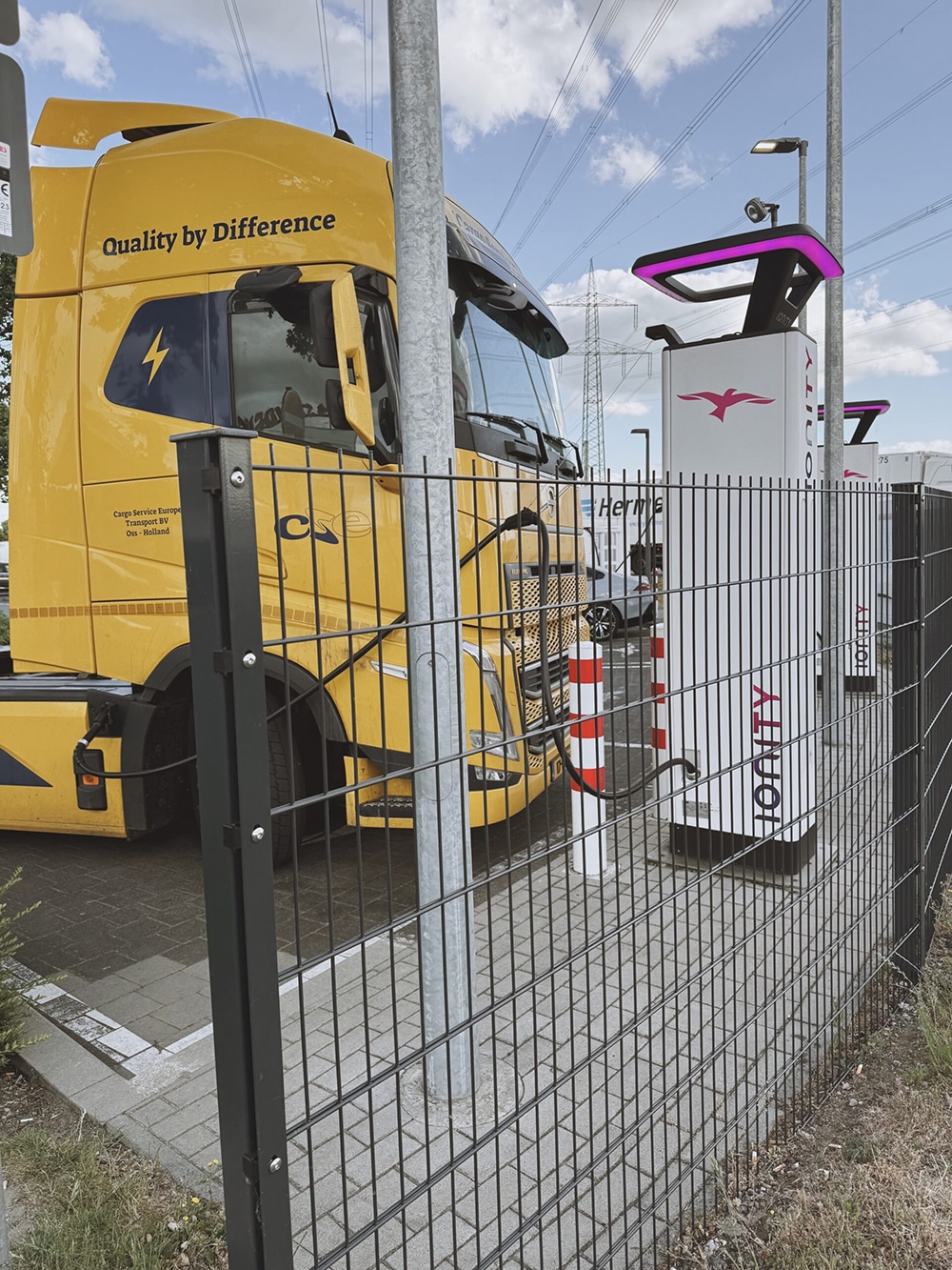 Electric truck at EV-Charging station, showcasing eMobility as the future of mobility.
